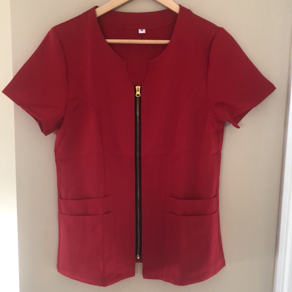 New without tag scrubs outfit. Add a different style to your collection.